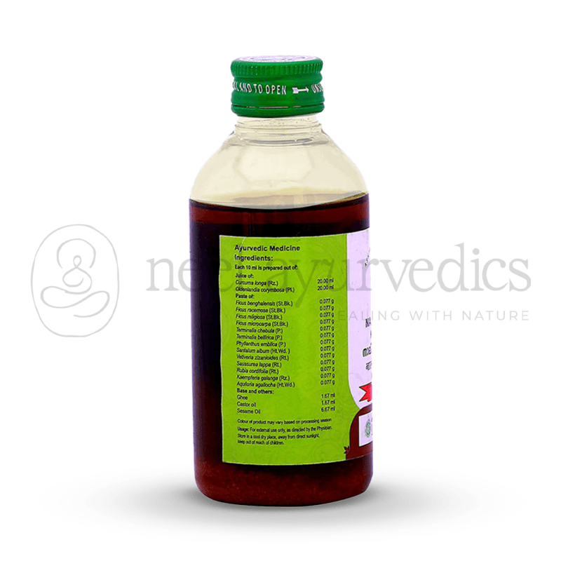 a bottle of liquid with a green label